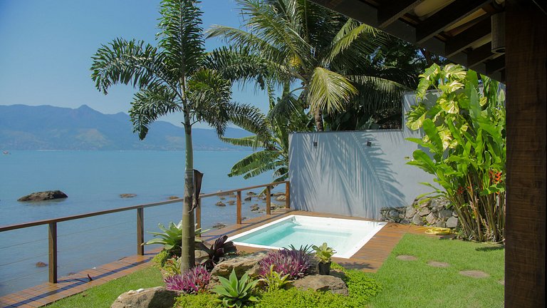 Casa pé na áreia em frente à Ilhabela