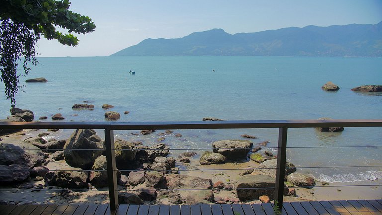 Casa pé na áreia em frente à Ilhabela