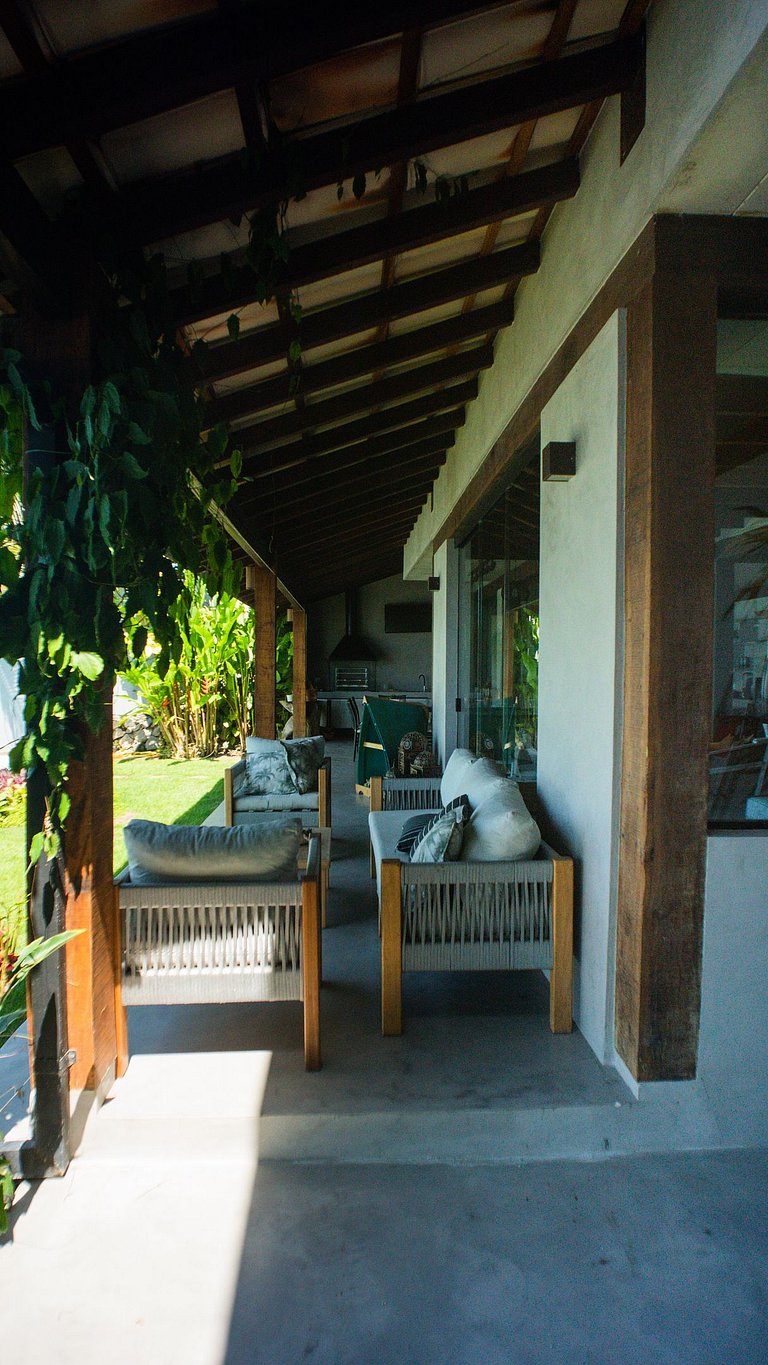 Casa pé na áreia em frente à Ilhabela