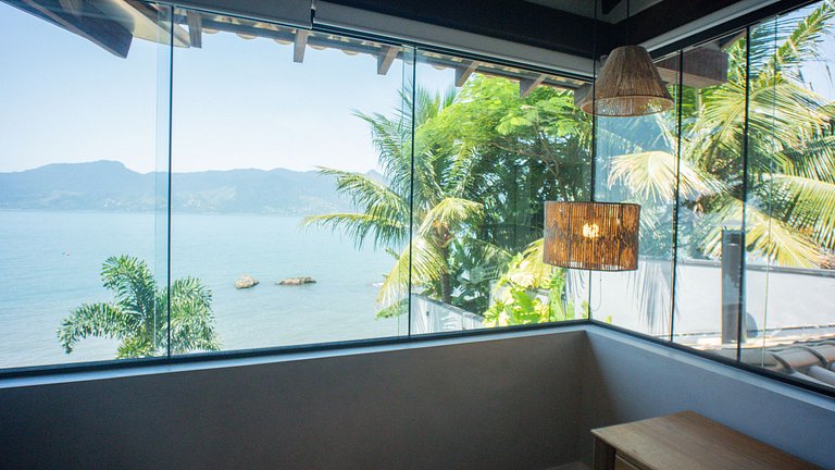 Casa pé na áreia em frente à Ilhabela