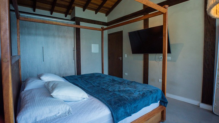 Casa pé na áreia em frente à Ilhabela