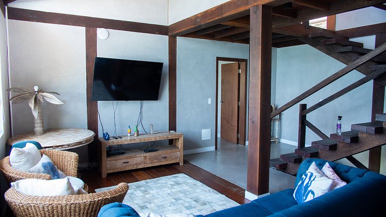 Casa pé na áreia em frente à Ilhabela