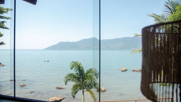 Casa pé na áreia em frente à Ilhabela