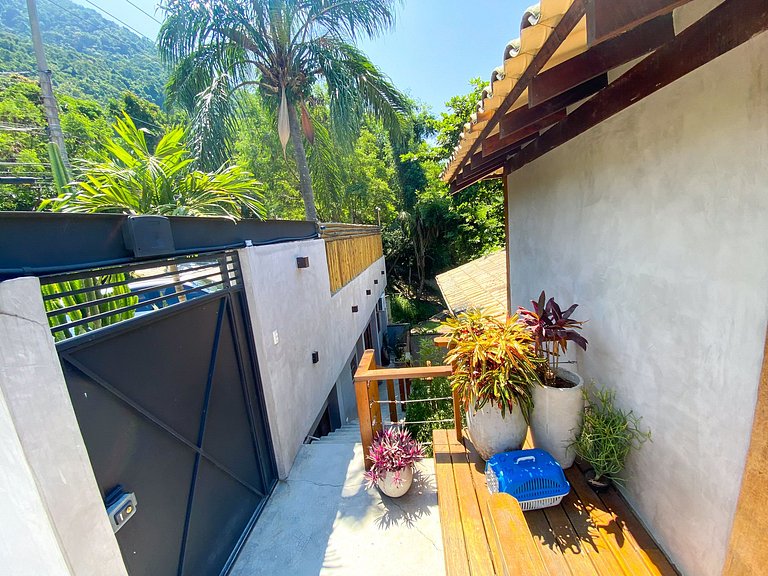 Casa pé na áreia em frente à Ilhabela