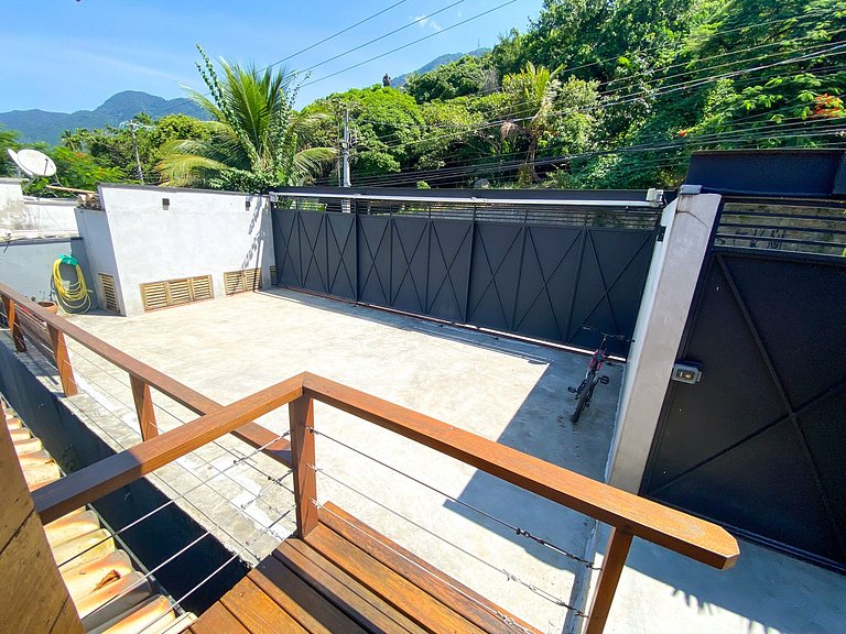 Casa pé na áreia em frente à Ilhabela