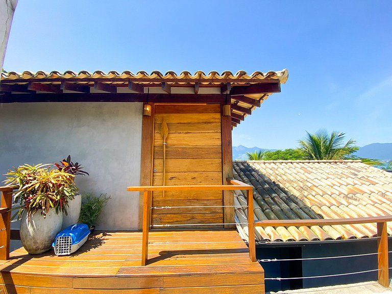 Casa pé na áreia em frente à Ilhabela